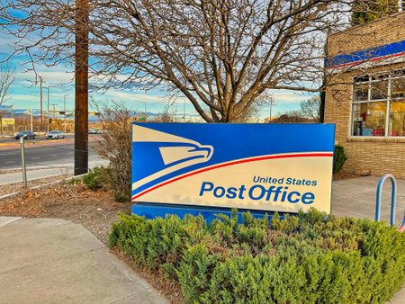 ALBUQUERQUE, NEW MEXICO, USA - March 8, 2023. United States Postal Service sign and logoのeditorial素材