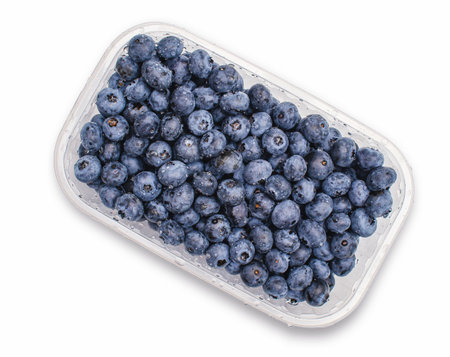 Top view transparent box with fresh blueberries isolated on white. Antioxidants, vitamins, healthの写真素材