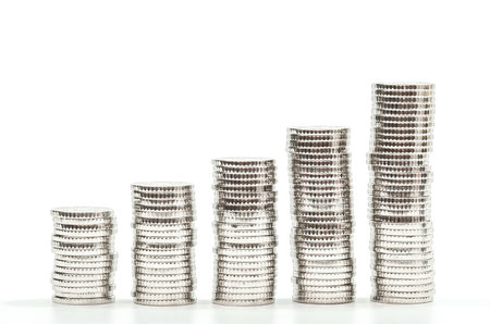 Silver coins chart on white background. Concept of growth finance, business, savings, deposit rateの写真素材