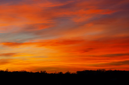 Dramatic scenic after sunset sky background. Twilight sky. Dark horizon of nature. Ideas for designの写真素材