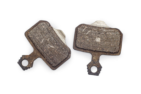 Worn Bicycle Brake Pads on White Background macroの写真素材