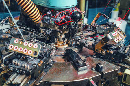 Dust from threads when making socks on knitting machine. Threads, parts, socks production