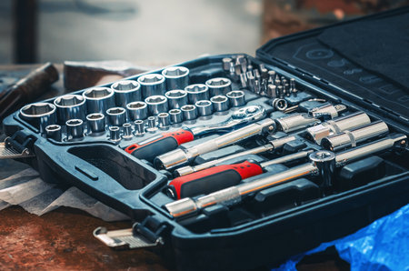Set of socket wrenches. Professional tool set in black case. Tool set includes socket wrench,...