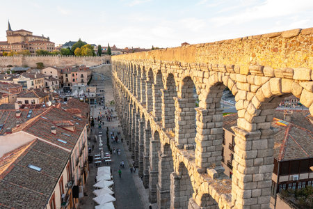 Roman aqueduct and Azogojno square of ancient Spanish European city of Segovia. Aqueduct of Segovia, Spain. Travel and tourist attractions concept.の写真素材