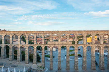 Roman aqueduct and Azogojno square of ancient Spanish European city of Segovia. Aqueduct of Segovia, Spain. Travel and tourist attractions concept.の写真素材