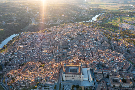 Aerial view of Toledo, Spain, showcasing medieval architecture, historical landmarks, and UNESCO World Heritage Site surrounded by scenic landscapes.の写真素材