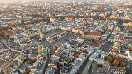 Aerial view of Krakow Old Town Square with St. Mary's Basilica and historic European architecture in sunny morning light. Tourism and travel.の写真素材