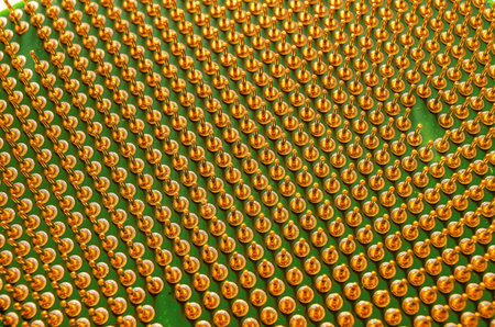 Macro of gold contact pins on computer CPU processor. Symbol of artificial intelligence, machine...