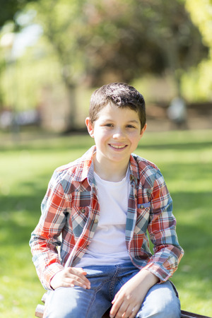 portrait of a casual teen boy, outdoorsの写真素材