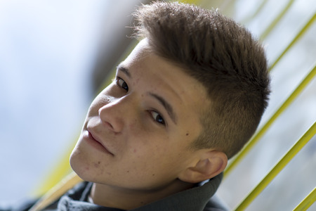 Portrait of Handsome teenage boy outdoorsの写真素材