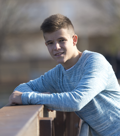 Portrait of Handsome teenage boy outdoorsの写真素材