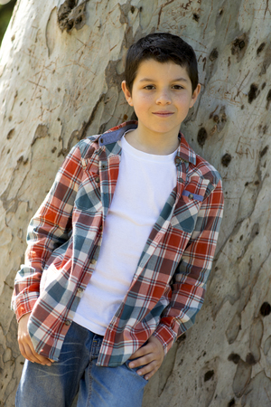 portrait of a casual teen boy, outdoorsの写真素材
