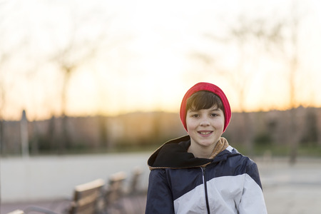 Young teenager portrait at sunriseの写真素材