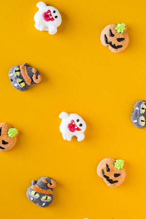 Halloween candies on an colored backgroundの写真素材