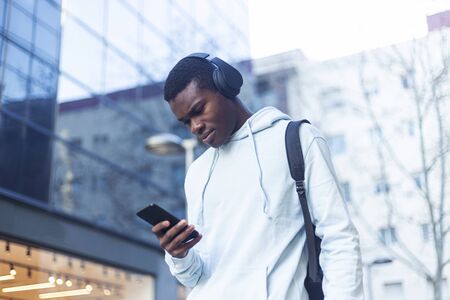 African Young Man Listening Music.