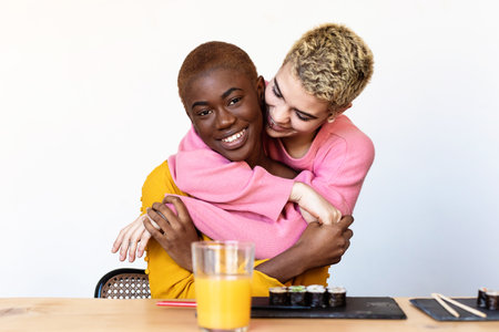 Portrait of a happy interracial homosexual couple huggingの写真素材