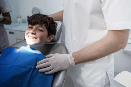 Little boy smiling in the dental office.