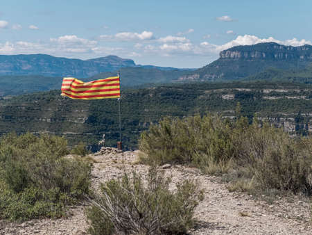 Catalonia flag on top mountainの写真素材
