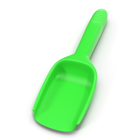 green toy spade, plastic shovel isolated on white background.の写真素材