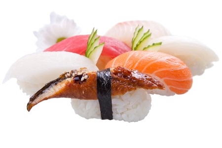 traditional Asian sushi rolls sashimi close-up shot in the studio on a white backgroundの写真素材