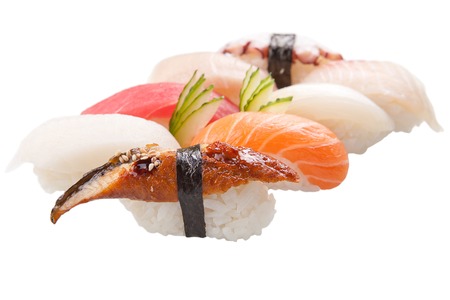 traditional Asian sushi rolls sashimi close-up shot in the studio on a white backgroundの写真素材