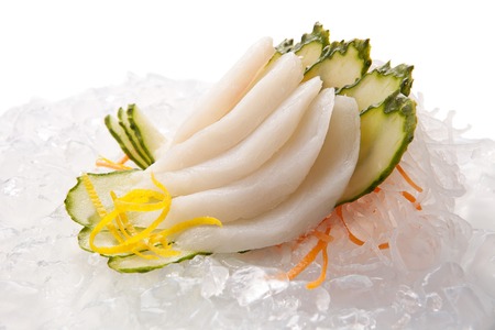 traditional Asian sushi rolls sashimi close-up shot in the studio on a white backgroundの写真素材