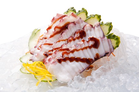 traditional Asian sushi rolls sashimi close-up shot in the studio on a white backgroundの写真素材
