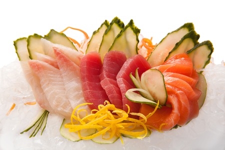 traditional Asian sushi rolls sashimi close-up shot in the studio on a white backgroundの写真素材