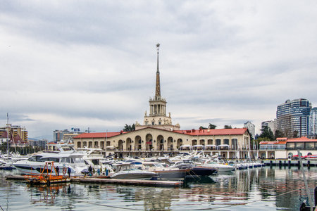 Sochi Russia February 8, 2019. Seaport on a cloudy day. View of the yachts and the building from the sea.のeditorial素材