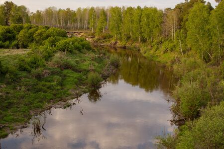 View of the taiga Siberian river Vagai. Spring landscape. Russia.の写真素材