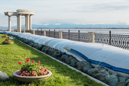 Khabarovsk, Russia - August 20, 2019: Barrier structures to prevent flooding of the Amur River embankment. The water level rose to a critical six meters.のeditorial素材