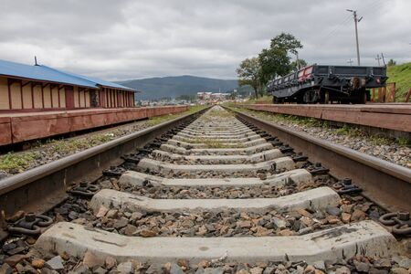 Rails extending into the distance. Close-up. Kultuk station of the old part of the Circum-Baikal Railway, Russia.の写真素材