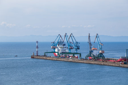 Korsakov, Russia - August 28, 2019. View of the pier of the Korsakov Sea Trade Port on Sakhalin Island.のeditorial素材