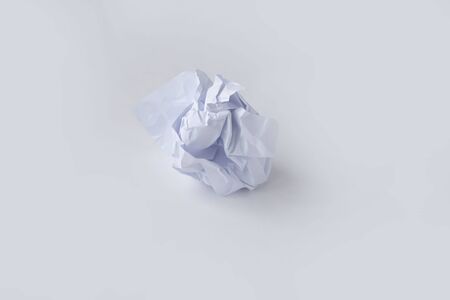 A clump of crumpled white paper on a white background. isolated.の写真素材
