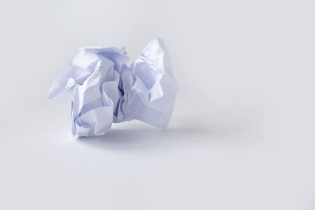 A clump of crumpled white paper on a white background. isolated.の写真素材