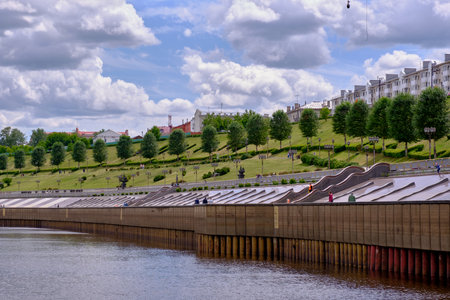 Tyumen, Russia - June 24, 2020: Cityscape. View of the embankment from the river Tura.のeditorial素材