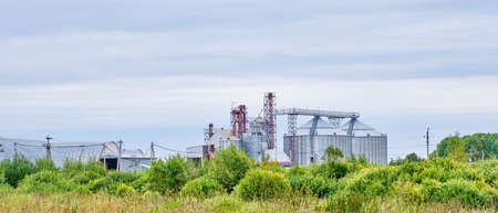 Grain processing complex, granary and elevator. Kularovo village, Vagaysky district, Tyumen region, Russia Bannerの写真素材