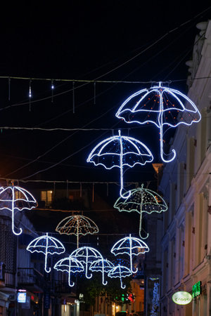 Yalta, Russia - September 18, 2020: Evening illumination in the form of glowing umbrellas on Morskaya street.のeditorial素材