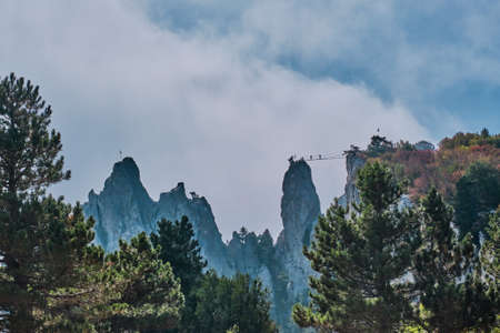 Beautiful mountain landscape of the southern Crimea. Ai Petri plateau. Suspension bridge between mountain battlements for extreme entertainment.の写真素材