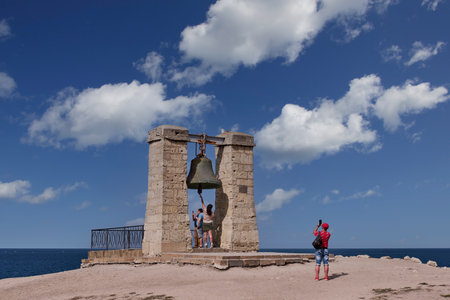 Sevastopol, Russia - September 25.2020: The ruins of the Chersonesos Taurica, its symbol, misty bell. Tourists visiting the sights. Sevastopol, Crimean Peninsula.のeditorial素材