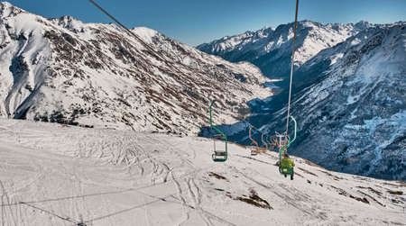 Winter mountain landscape of the Elbrus region, Kabardino-Balkaria, Russia. Chairlift on Mount Cheget. Baksan gorge.の写真素材