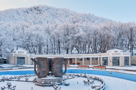 Zheleznovodsk, Russia - January 19, 2021: Cascade fountain and pump-room with mineral water Smirnovsky source in winter.のeditorial素材