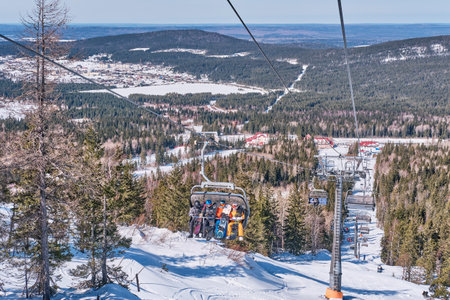 Beautiful winter mountain landscape of the Urals region, Russia. Chairlift on the Mount Belaya.のeditorial素材