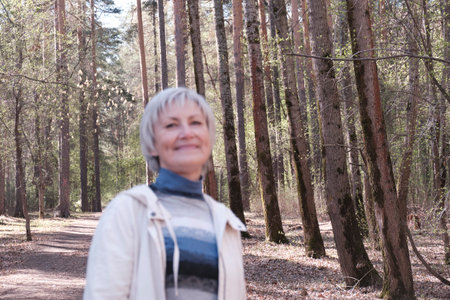 Portrait of a senior Caucasian woman out of focus.の写真素材