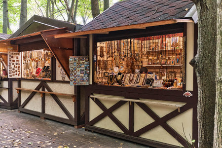 Wooden stalls in german half-timbered style with Baltic souvenirs for tourists, amber jewelryのeditorial素材