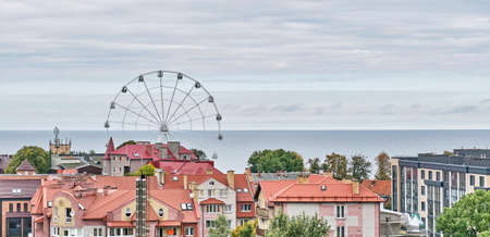 View of city of Zelenogradsk, ferris wheel and Baltic Sea, Russia. Modern residential buildings.の写真素材