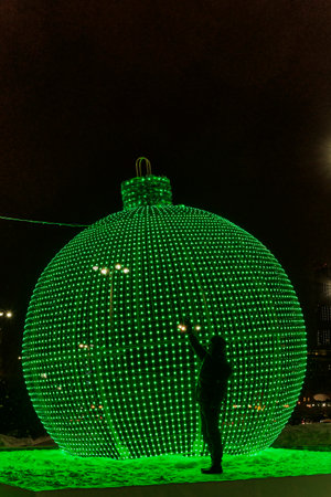 Big green ball of Christmas tree - New Years decoration of street of Yekaterinburg, Russia.のeditorial素材