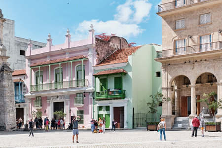 Tourists walking on San Francisco Square, Havana, Cuba. Colonial buildings in Old Havanaのeditorial素材