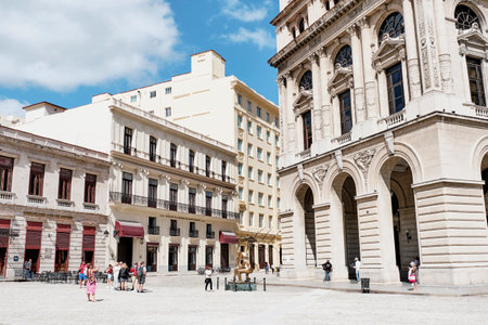 San Francisco Square in Old Havana. Building of Trading Exchange. Tourists walking on public square.のeditorial素材