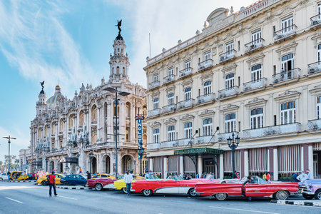 Grand Theater of Havana, oldest hotel Inglaterra, parked colorful retro cars for touristsのeditorial素材
